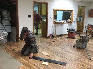 Working hard to get the new floor done!
